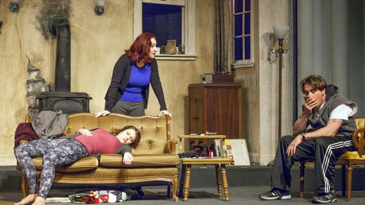 Angela Bubash, reclining, Sarajane Alverson and Jeff Kargus in "I'll Be Back Before Midnight" now on stage at Stray Dog Theatre in St. Louis.