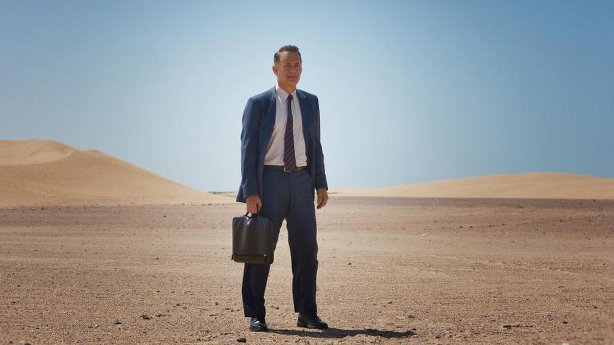Tom Hanks as Alan Clay takes a walk in the desert in "A Hologram for the King."