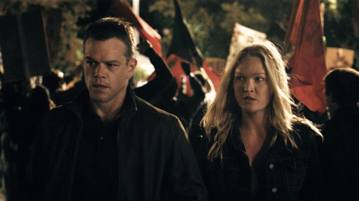 Matt Damon and Julia Stiles in a scene from the new film "Jason Bourne." Damon plays a formidable killing machine, never smiling