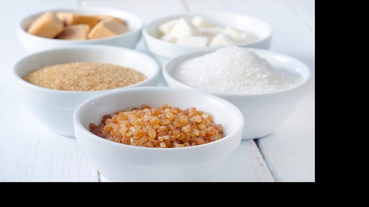 
Demerara is in foreground, with turbinado on the left and cater on the right. In the background are cubes of brown and granulated sugar.
