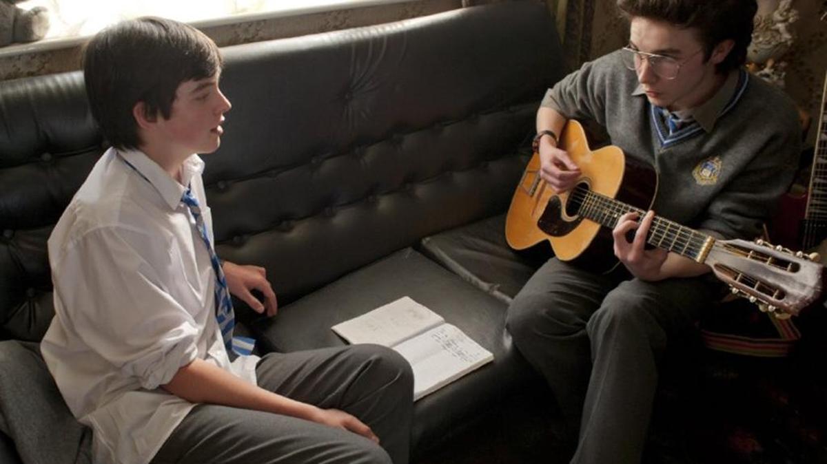 Ferdia Walsh-Peelo and Mark McKenna in “Sing Street.”