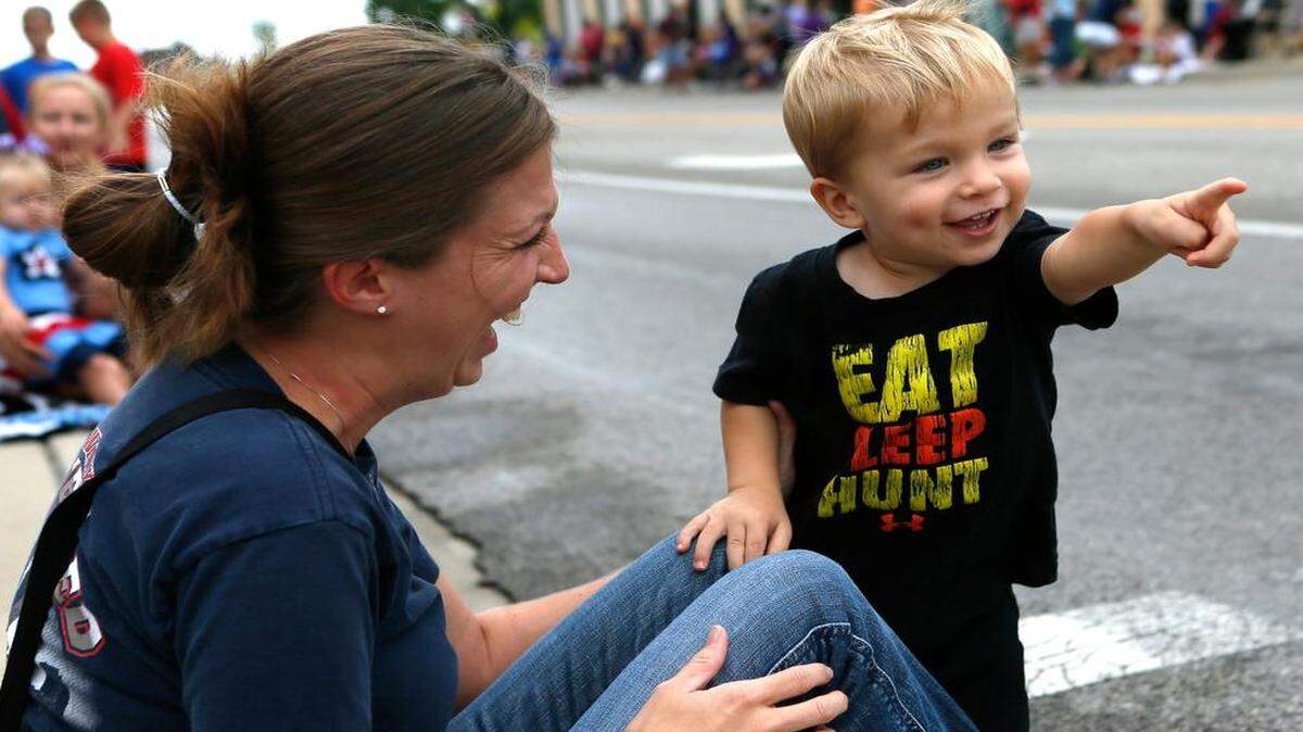 
Wyatt Kraemer, 2, and his mother Terri enjoyed last year’s Labor Day Parade in Bellevile. You and your kids will be smiling when the parade returns to help kick off a fun month in September.
