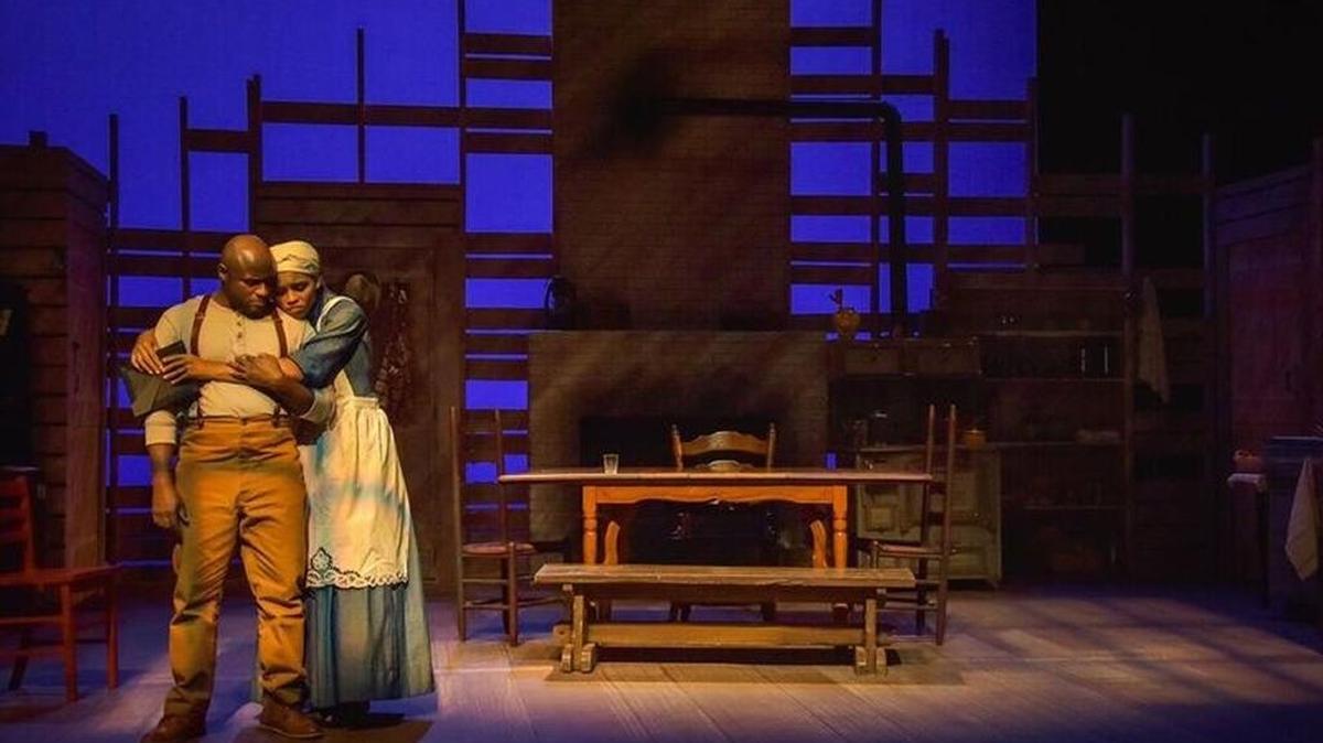 Eric J. Conners as John and Alicia Reve Like as Clarissa embrace in a scene from “Miss Julie, Clarissa and John” Saturday and Sunday at the Edison Theatre on the campus of Washington University.