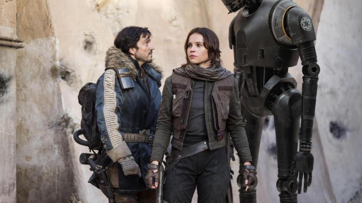 Felicity Jones and Diego Luna get some help from a sarcastic droid K-2S0 (Alan Tudyk).