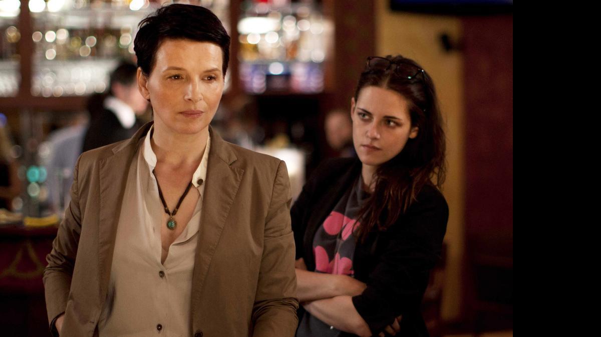 
 Juliette Binoche plays an aging actress, left, with Kristen Stewart as her assistant in “Clouds of Sils Maria.”
