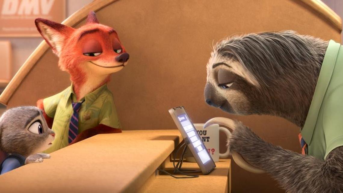 Judy Hopps, left, voiced by Ginnifer Goodwin, and Nick Wilde, voiced by Jason Bateman, second left, in a scene from the animated film, "Zootopia."