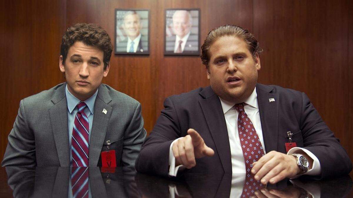 Miles Teller, left, as David and Jonah Hill as Efraim in "War Dogs."