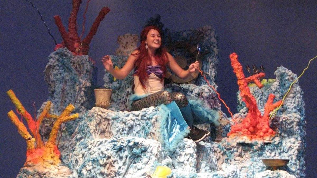 Ariel (Morgan Ladyman, of Dupo) longs to be part of the human world in this scene of “Little Mermaid.” The Take A Bow Showcase production ist at Belleville East Performing Arts Center Thursday through Sunday.
