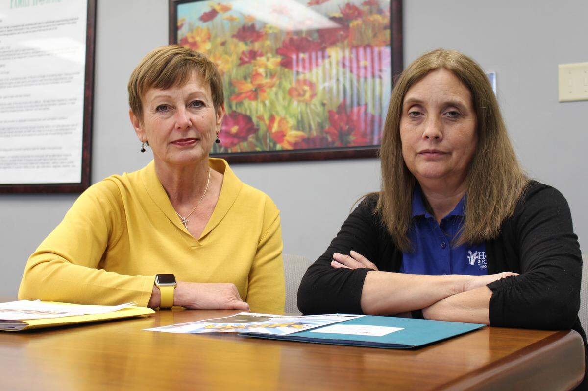 Ellen Krohne, left, wrote and self-published the book, “Heartbroken: Grief and Hope Inside the Opioid Crisis.” She’s shown in 2019 with contributor Diana Cuddeback. Not pictured is contributor Matthew Ellis.
