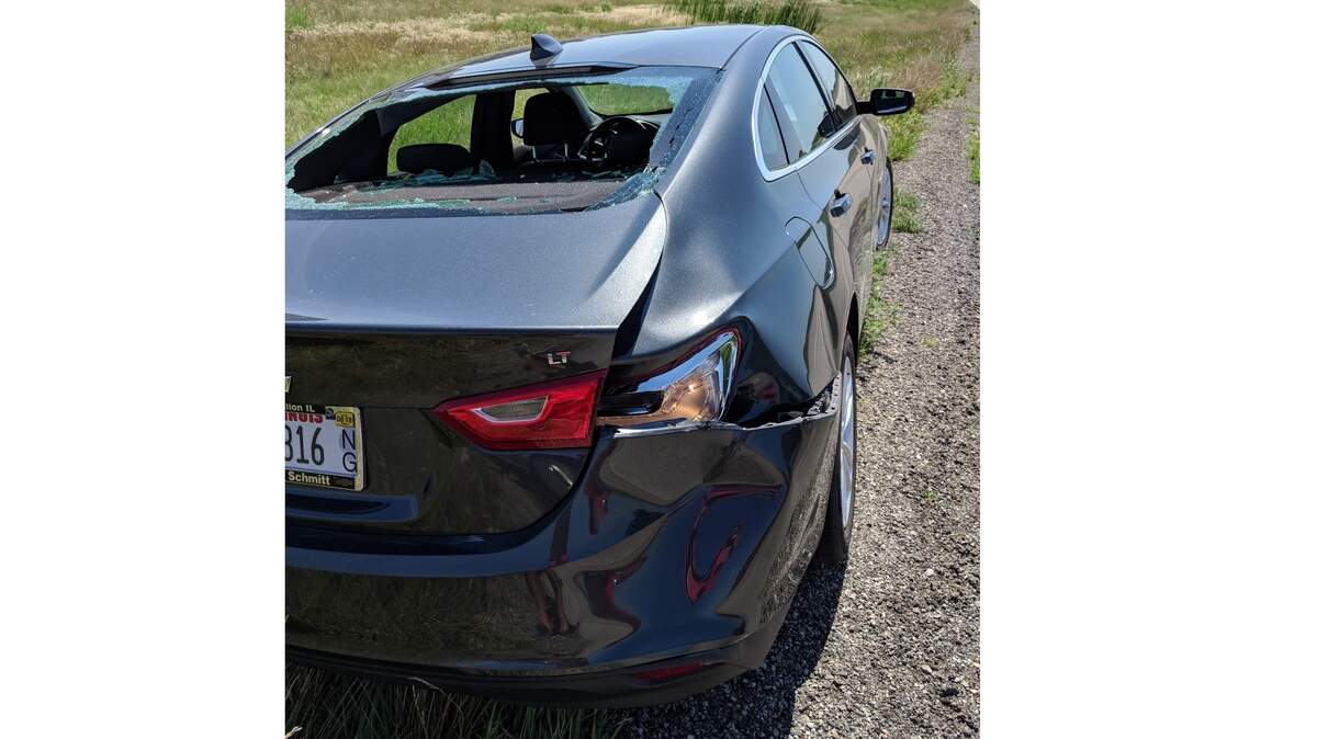 An O’Fallon, IL, family’s 2016 Chevrolet Malibu had trunk, panel and passenger-side damage as well as a shattered back window after a plane hit it while landing on Interstate 55 near Lincoln, IL, on Wednesday.