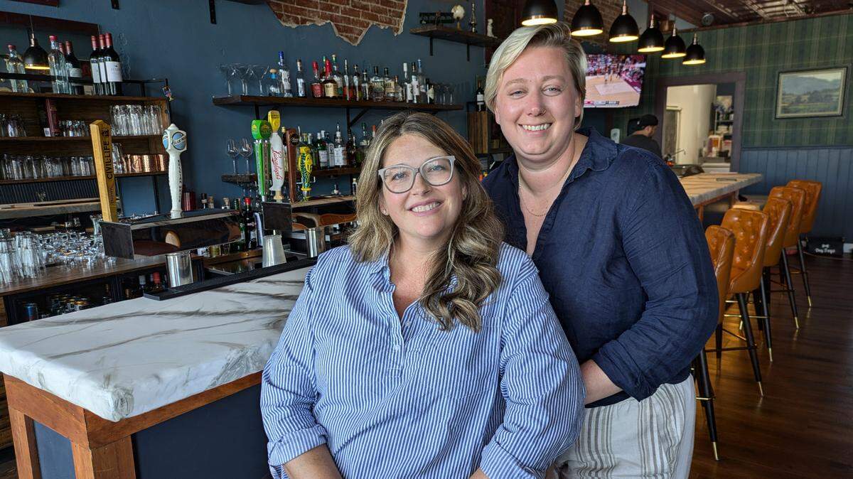 Kristen Keller (seated) and Crissy Nordin, owners of The Upright Pub & Music Parlor in O’Fallon