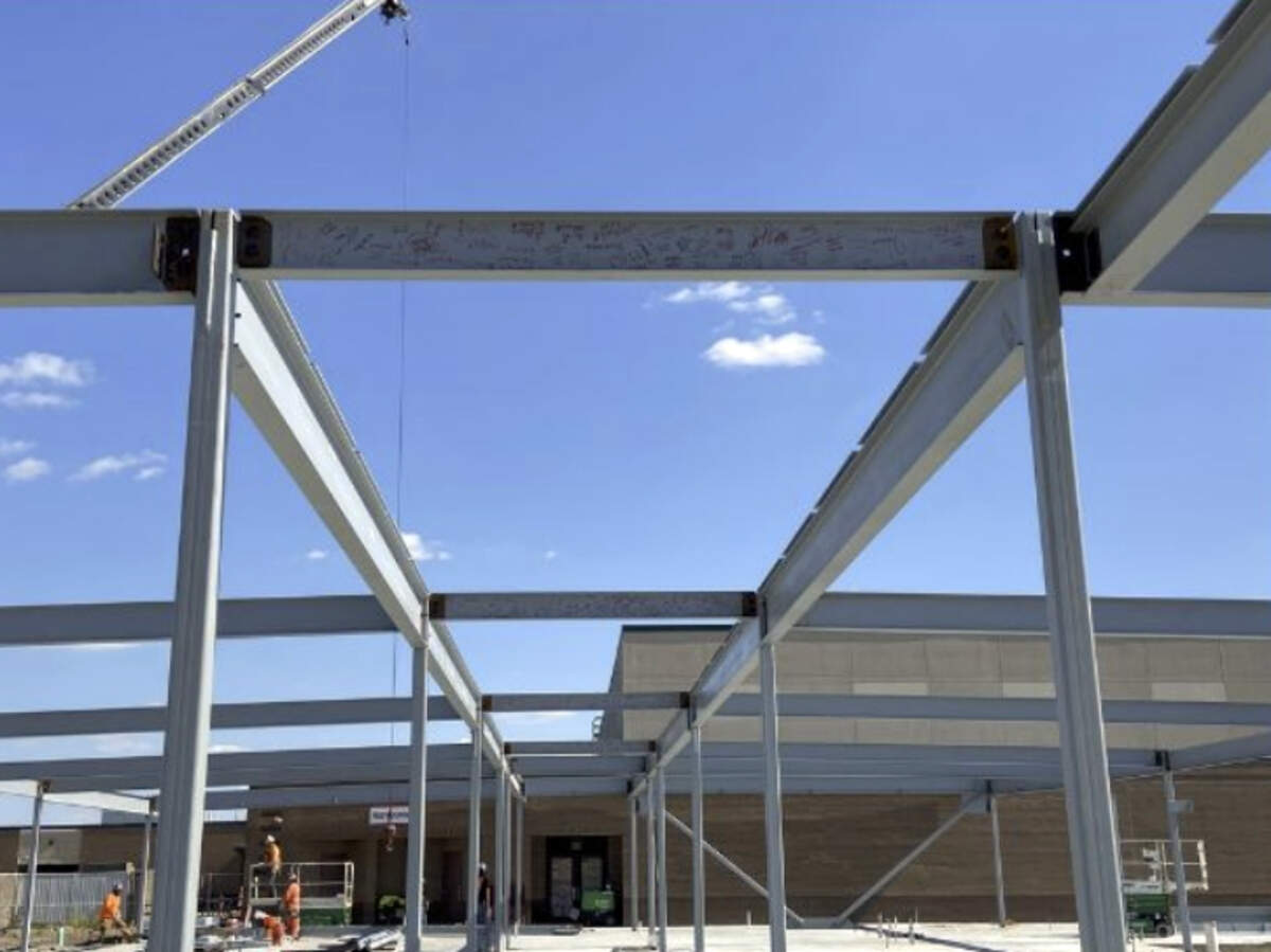 signed beam in place