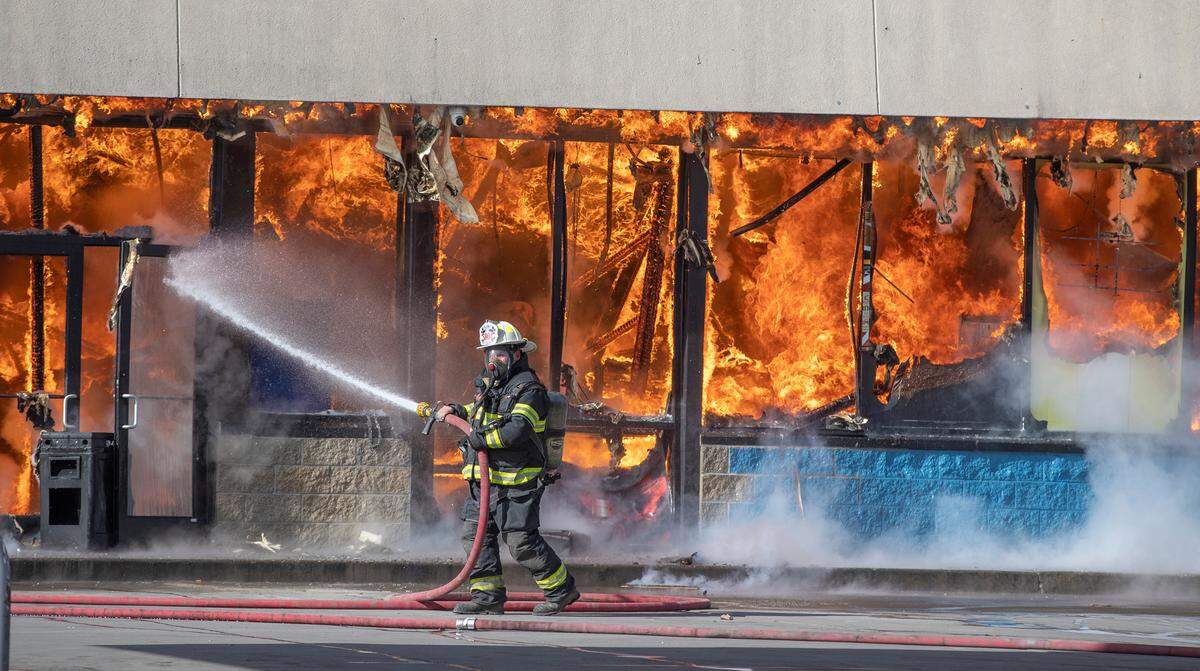 A fire quickly gets out of control at the Crown Food Mart and convenience store in Washington Park. A Washington Park firefighter that arrived on the scene before help arrived tried to get the fire under control. Several departments from the area assisted Washington Park. An employee of the store said they quickly got employees and customers out of the store with no injuries.