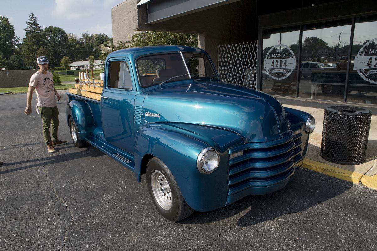 Kaleidoscope Craft Brew Coffee and their 1952 Chevrolet truck outfitted with taps to dispense their cold craft brew coffee.