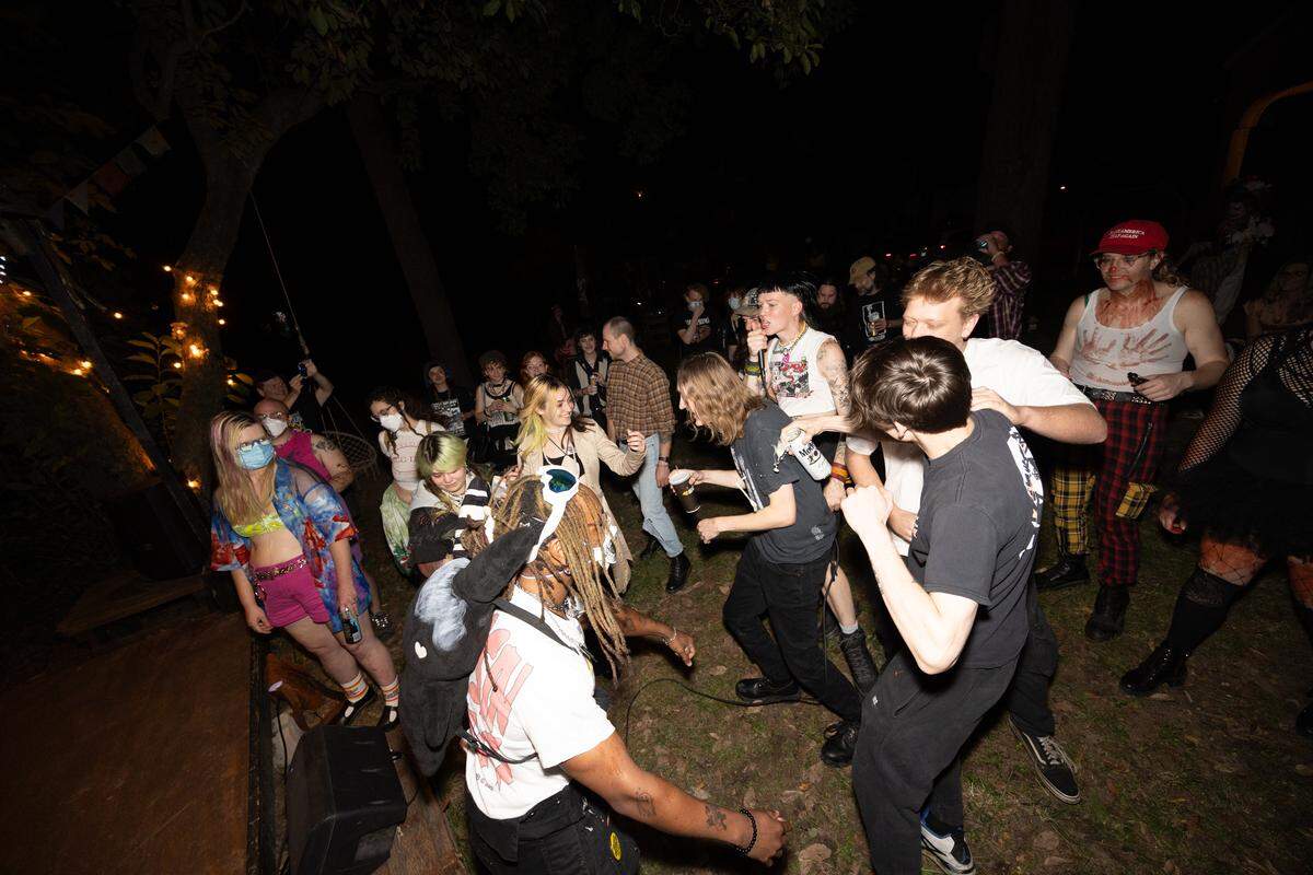 A crowd dances during a performance at the Nunnery in 2024, before the city threatened fines for alleged zoning violations.