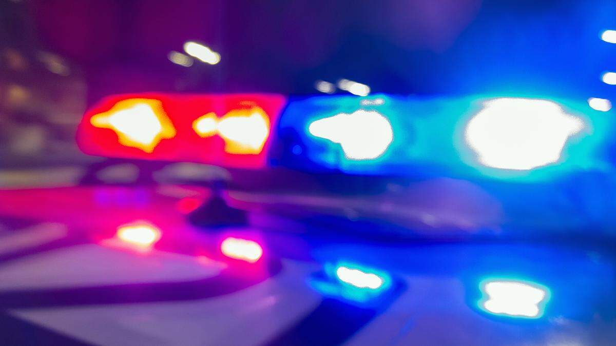 Wood River police have a person of interest in custody tied to the shooting death of a 23-year-old man that took place early Monday morning.