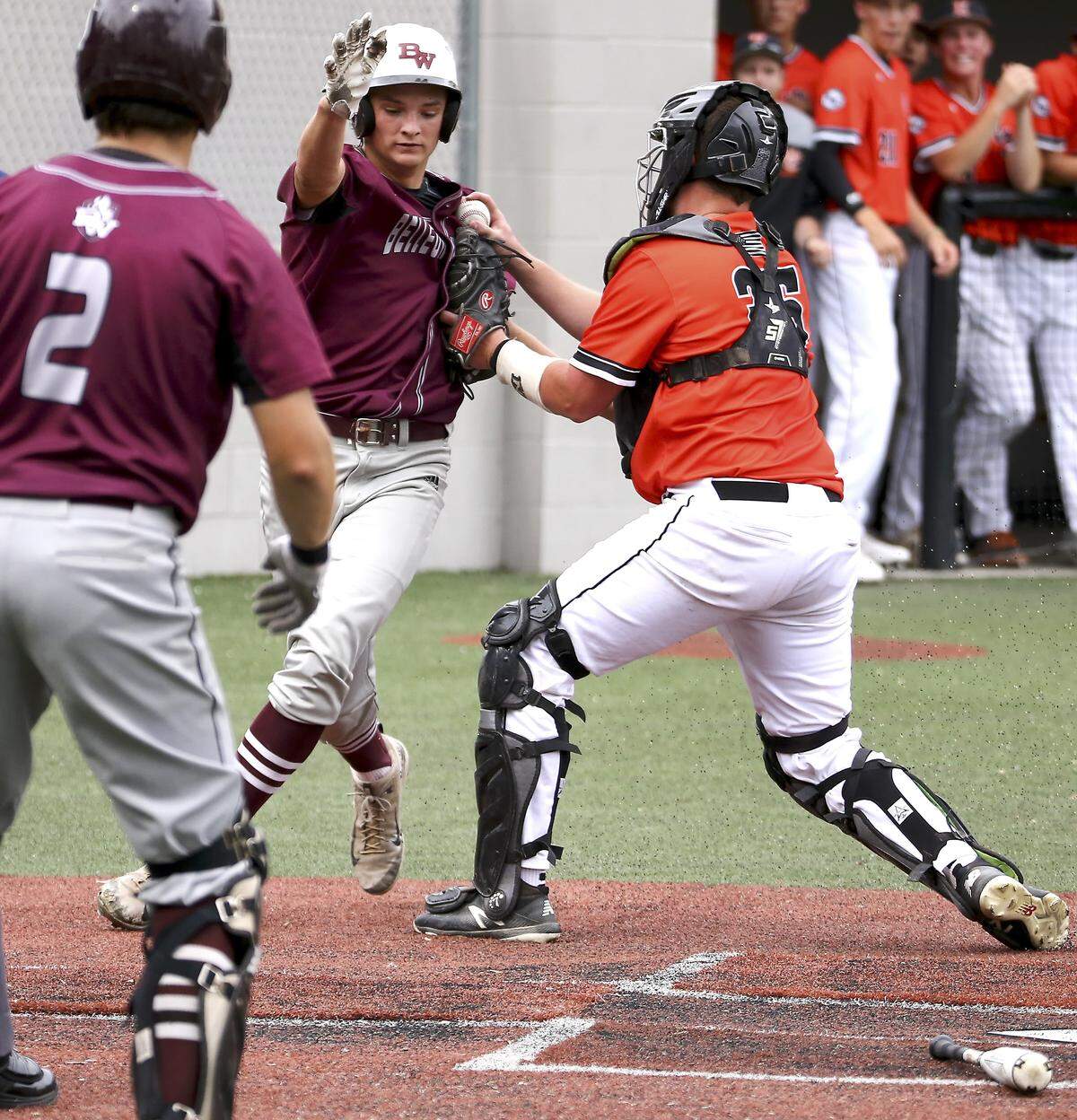 Edwardsville’s Jacob Kitchen puts the tag on Belleville West Joey Kossina in the first inning during Wednesday’s Class 4A sectional semifinal game at Blazier Field in O’Fallon.
