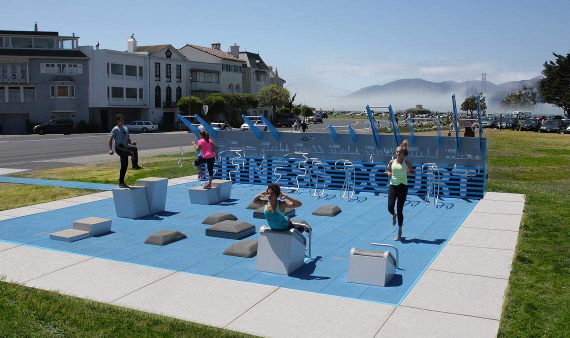 People demonstrate exercises on the first Fitness Court, designed by the National Fitness Campaign and built in San Francisco, California. There are now about 500 of the outdoor gyms across the United States.