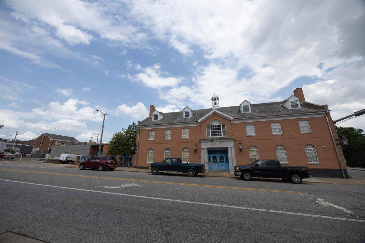 The former Belleville News-Democrat building on the corner of South Illinois Street and East Lincoln Street has sat vacant for about five years. Construction activity outside is part of a project to convert it into a single-family home.