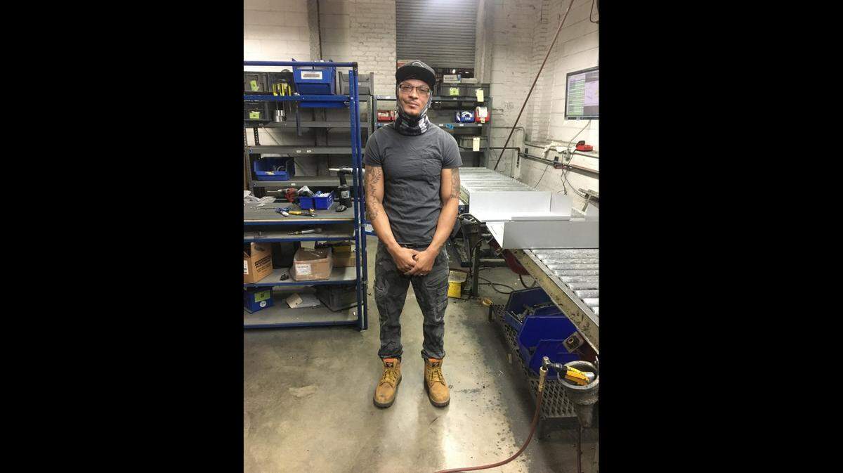 J.D. Dixon was the main organizer of a Black Lives Matter protest in Belleville on Friday that started at Empire Comfort Systems, where he works as a machinist.