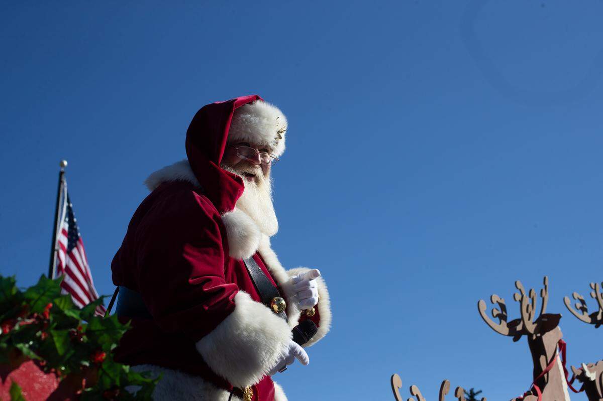 Santa returns to downtown Belleville during the Belleville Santa Parade on Friday.