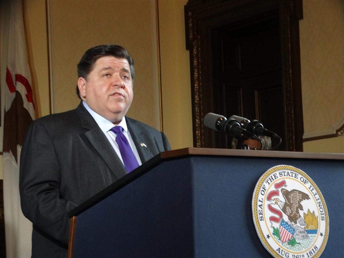 Gov. J.B. Pritzker speaks at a news conference in his office at the Capitol on Thursday. Fitch Ratings raised the state of Illinois’ rating for general obligation bonds two notches, to BBB+, making it the second rating agency to do so in recent weeks and marking the fourth time the state has received a credit upgrade in the last year.