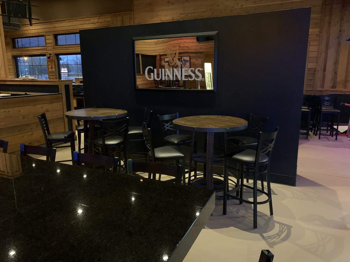 Customers can sit at high-top tables in the bar at Signature Tap House, which is expected to open Feb. 1 near St. Clair Square in Fairview Heights.