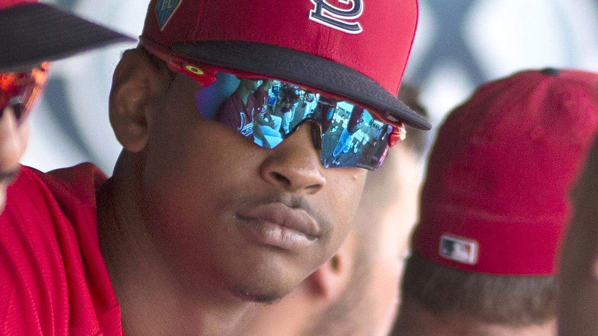 Relief pitcher Alex Reyes in the dugout during a spring training game in Jupiter, Florida.
