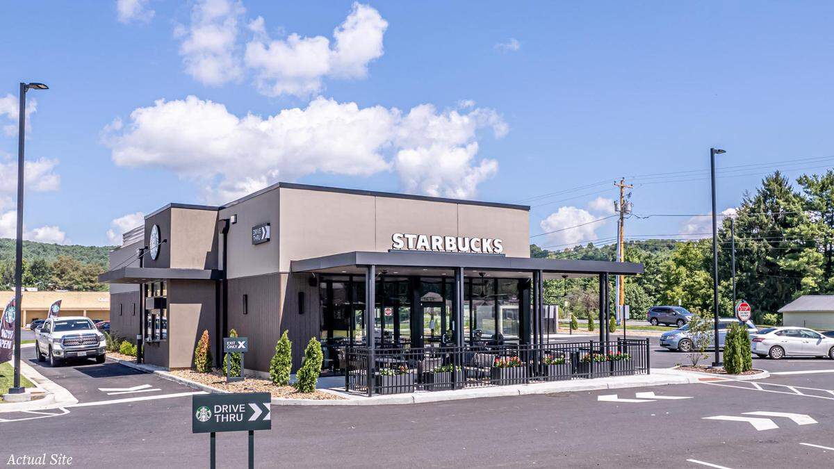 Rendering of a Starbucks building design for a drive-through and covered patio