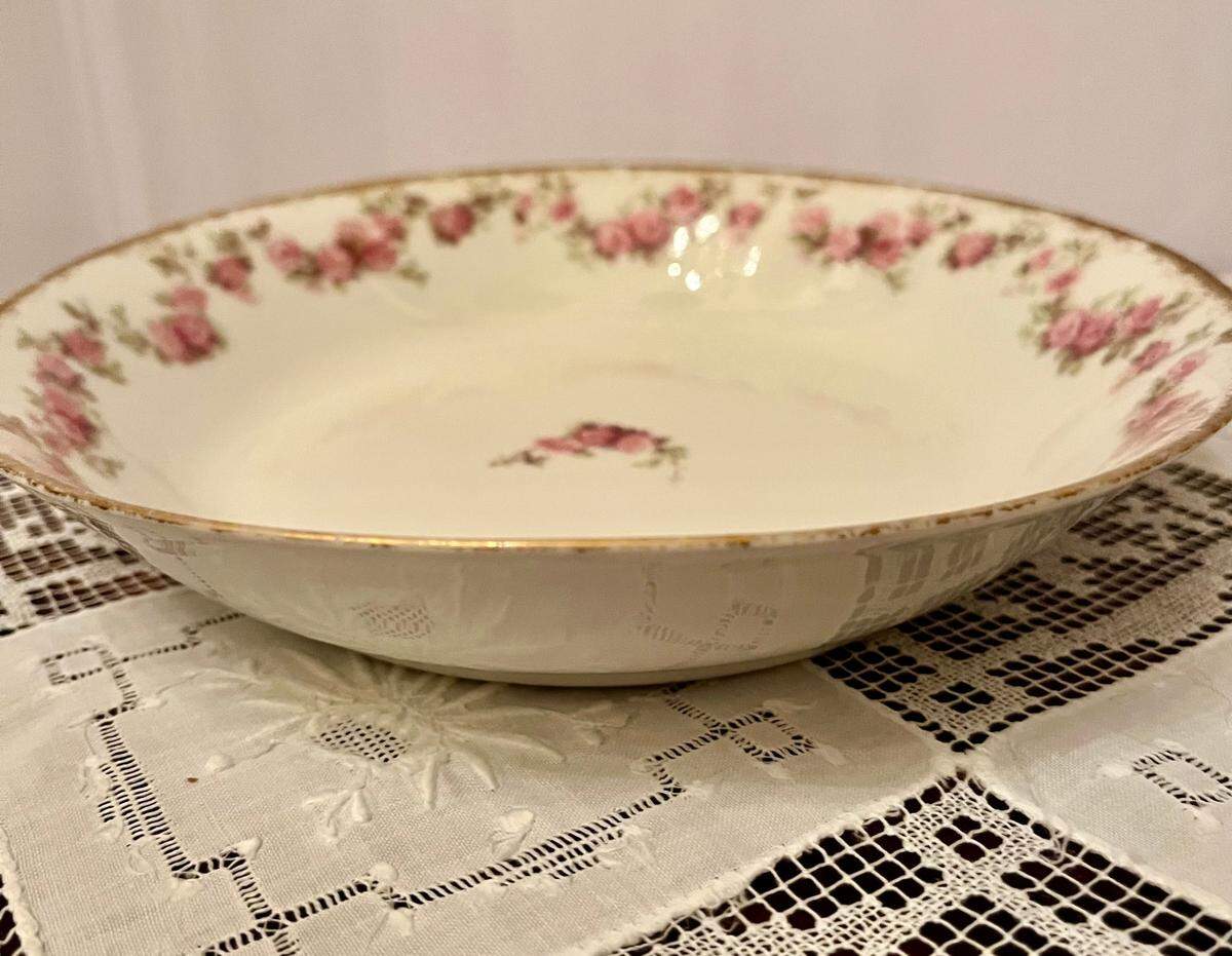 An unrimmed china soup or cereal bowl. It is 7-1/4” in diameter and 1-1/4” deep, which is considered shallow.