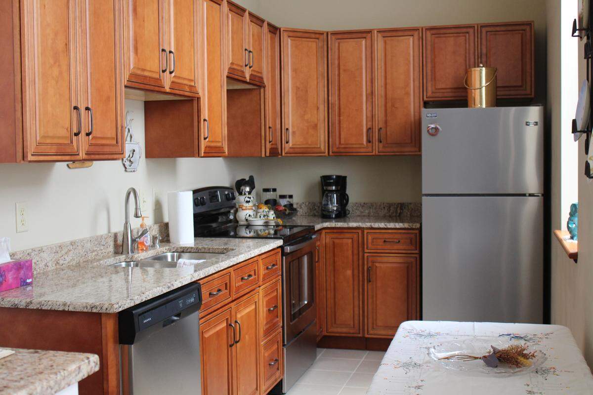 The old St. Paul's Lutheran Church schoolhouse has been renovated for small gatherings. It has a modern kitchen with cabinets, appliances, dishes and silverware.