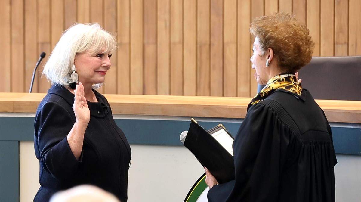 Belleville Mayor-elect Patty Gregory, the founder and executive director of Art on the Square, is sworn in as mayor by retired 20th Judicial Circuit Judge Annette Eckert.  Gregory defeated longtime incumbent Mayor Mark Eckert and write-in candidate Jeffrey “J.D.” Dixon.