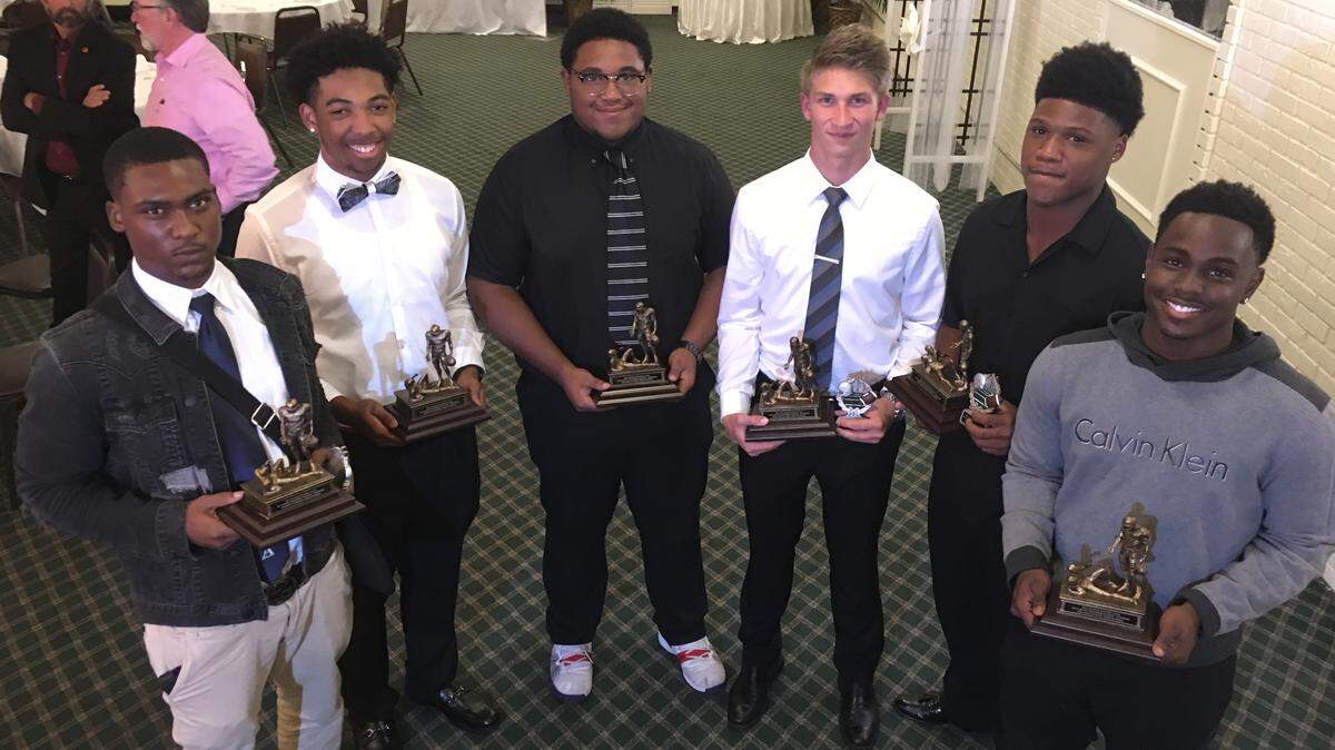 The Rotary Club of Belleville and Belleville News-Democrat Monday recognized the All-City Football Team at their 74th annual banquet.  Offensive and defensive Most Valuable Players were selected by the coaching staff of each of Belleville’s three high schools. They are, from left to right, Althoff’s Cam Rodgers and Darius Walker, Belleville West’s Anthony Graham and Jack McCloskey, and Belleville East’s Rakweon Ramsey and Kienen Waller.