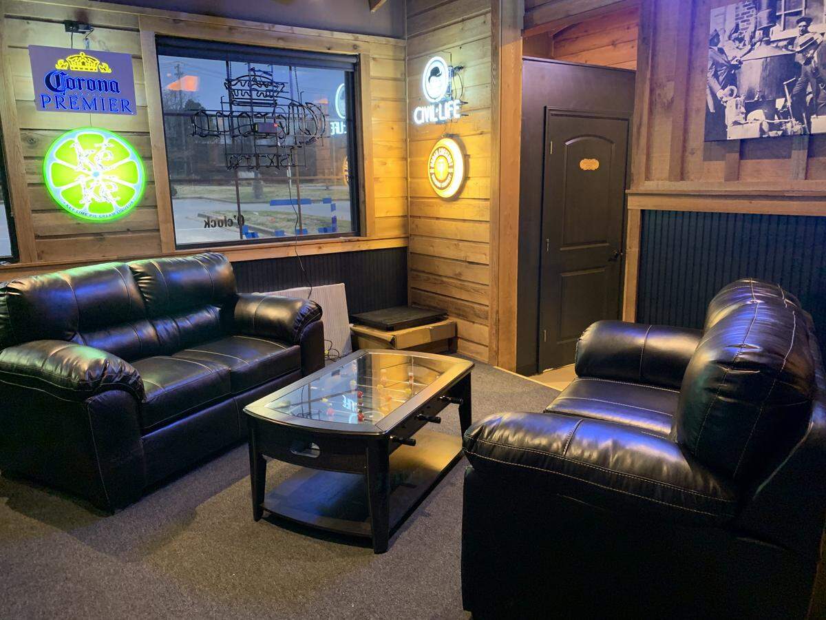 The bar has sitting areas with leather couches at Signature Tap House, which is expected to open Feb. 1 near St. Clair Square in Fairview Heights.