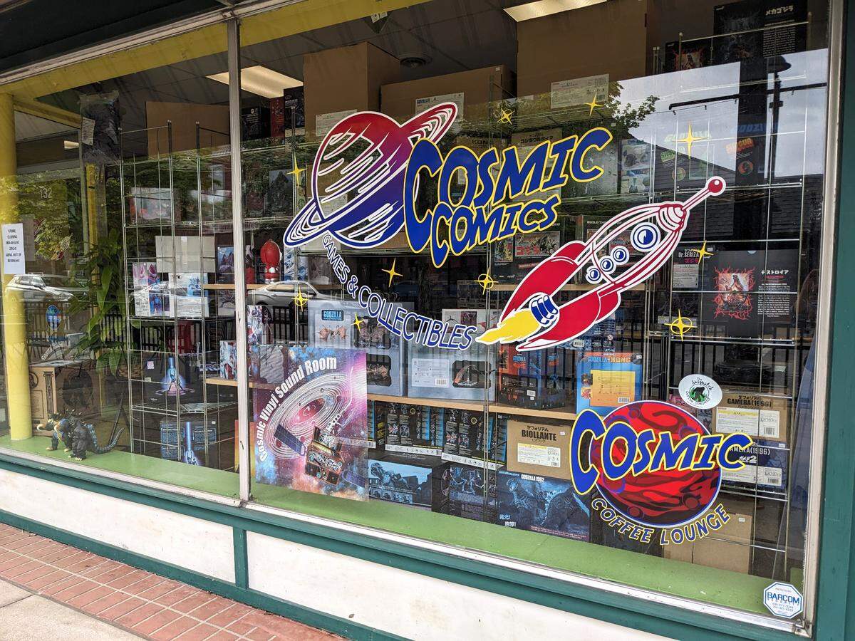 Godzilla products available at Cosmic Comics in downtown Belleville can be seen through the front window.