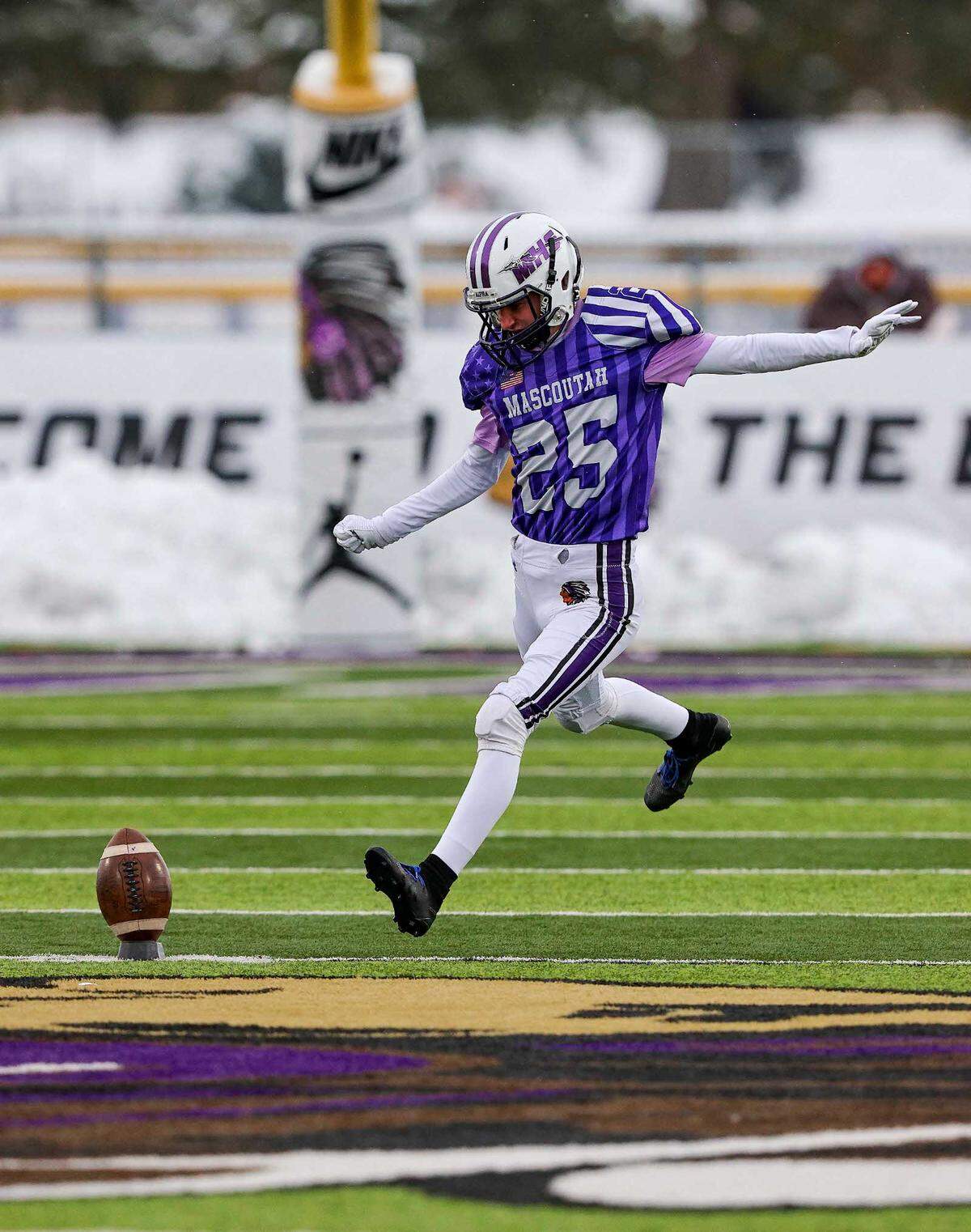 Mascoutah’s Ethan Dee kicks off during Saturday’s IHSA Class 5A quarterfinal game against Peoria High School. The Indians led 21-14 at halftime but ultimately fell to the Lions 36-21.