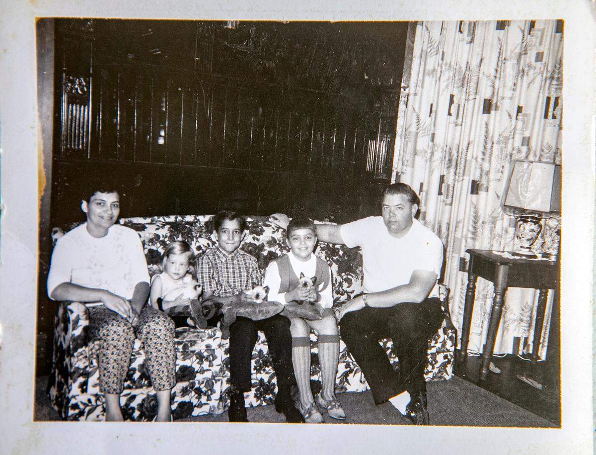 Pat, Vickie, Eric, Tina and Harold Gentz pose on a couch in the 1960s at “The Pink House” in Aviston. The family sold the home in December after owning it for more than 60 years.