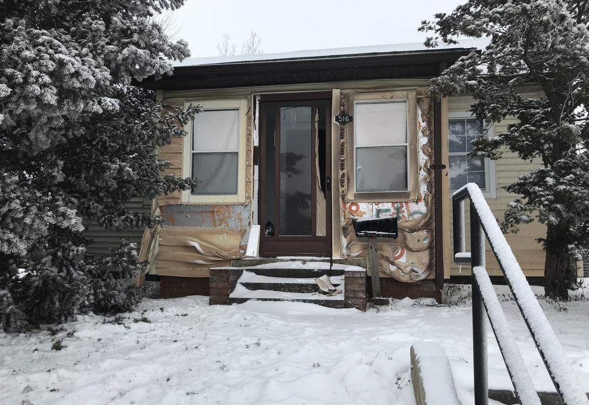 Strong winds blew flames and heat from a fire that destroyed an R.P. Lumber Co. outbuilding in Edwardsville on Monday, breaking windows and melting siding on homes across the street.