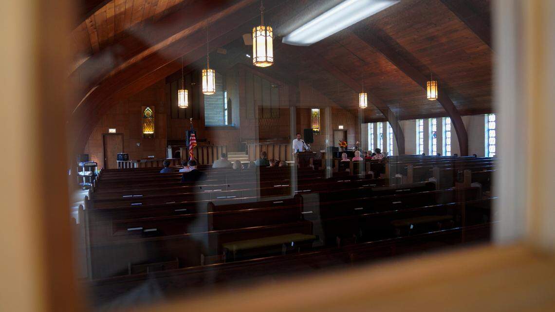 Pastor Ryan Burge, an associate professor of political science at Eastern Illinois University and author of, “The Nones,” a book on the growing number of religiously unaffiliated Americans, preaches a sermon at First Baptist Church in Mt. Vernon, Ill., Sunday, Sept. 10, 2023. For Burge, the rising number of “nones” and the dwindling number of religious is not simply a statistic, but a fact that he’s been witnessing in his own parish for the past 16 years. (AP Photo/Jessie Wardarski)