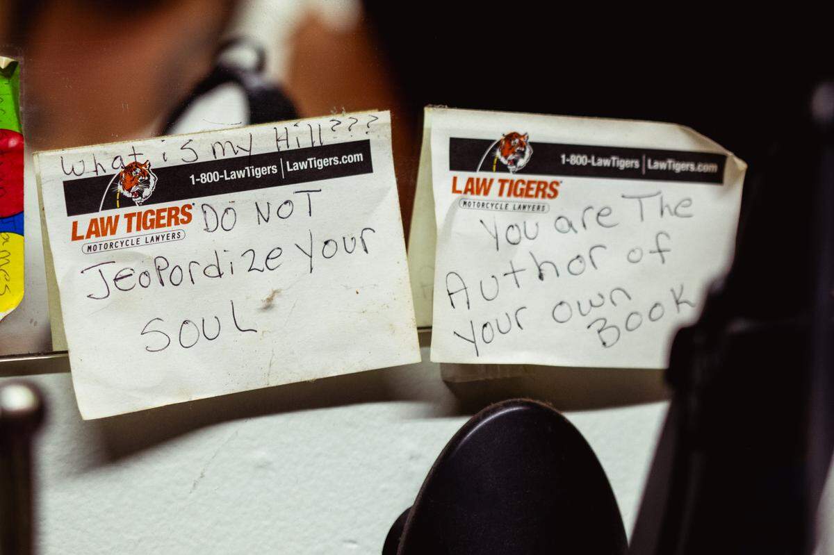 Weber displays motivational messages in her bedroom on Sunday, July 21, 2024, at her home in Collinsville, Illinois. “I have these taped up at the top so I can read them every day” she said. “I’m focusing on recognizing the good in myself and understanding that I generate my own meaning.”