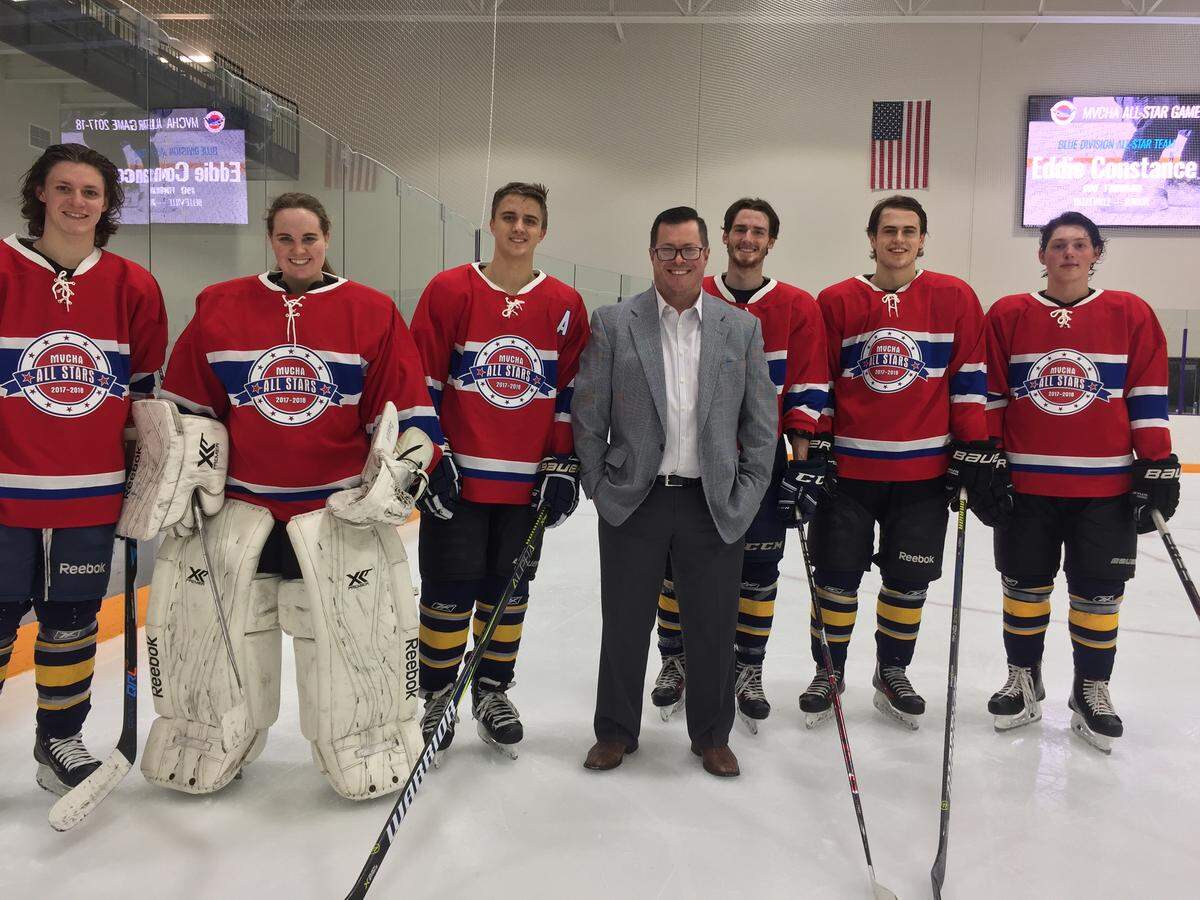 O'Fallon hockey coach Jason Power stands with his group of All-Stars. From left are Logan Drolet, Kristen Smith, Chris Duncan, coach Power, Travis Manthe, Graham Sudduth, and Jack Wallace. All are seniors with the exception of Wallace, who is a junior.