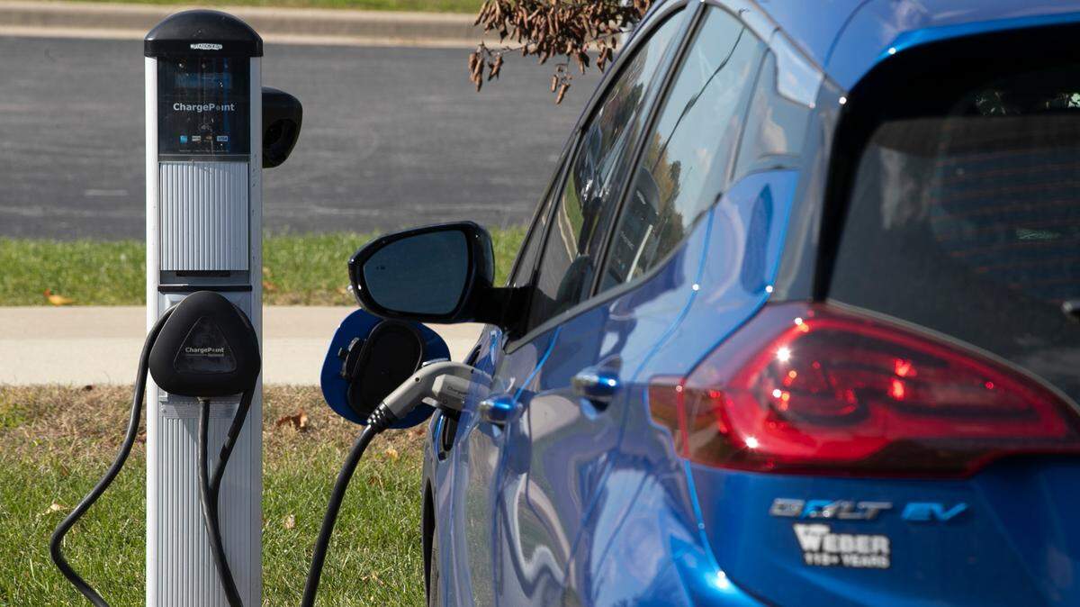 An electric vehicle charges on the Southwestern Illinois College campus parking lot in Belleville. There are several charging stations in the parking lot near the Liberal Arts building.