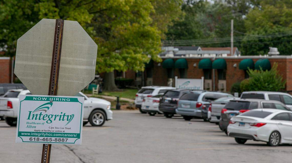 Integrity Healthcare of Alton displays a “now hiring” sign near its parking lot in late 2021.
