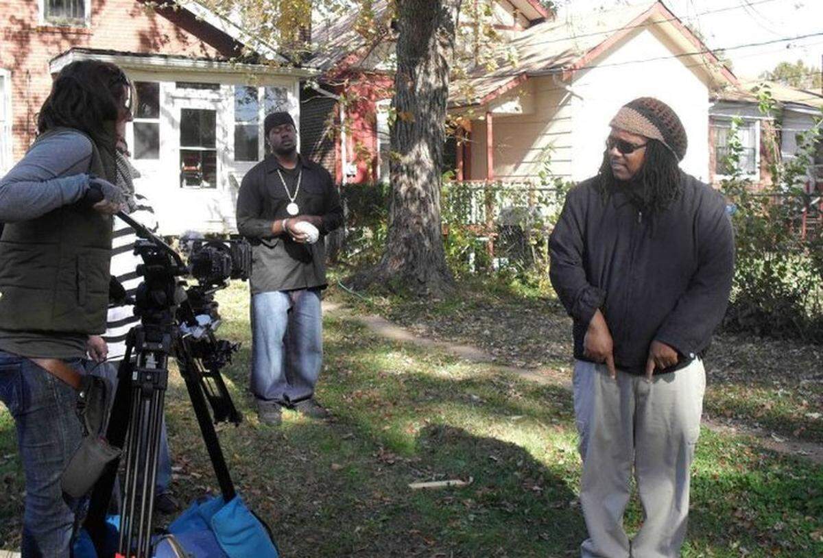 Director Kevin Coleman, right, works with actor Antonio St. James, center, and camerawoman Hannah Radcliffe during “Osi” filming in 2010.