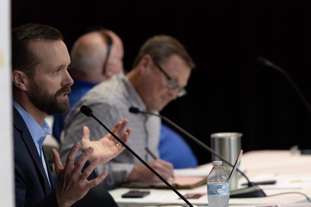 Madison County Board Chairman Chris Slusser speaks to Troy residents during a meeting regarding a possible data center development project in Troy.