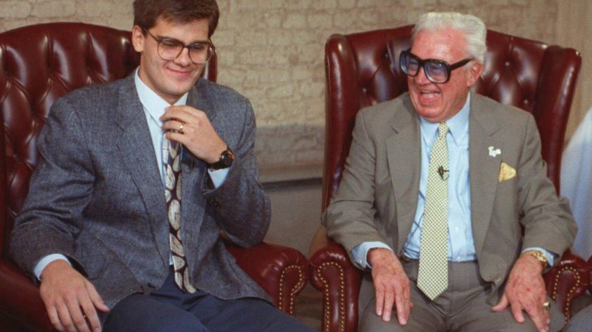 Hall of Fame baseball announcer Harry Caray, right, laughs with his grandson Chip in Chicago in this May 13, 1991, file photo. Longtime broadcaster Chip Caray is taking over as the play-by-play voice of the St. Louis Cardinals, more than five decades after his grandfather and Hall of Fame broadcaster Harry Caray became a baseball staple with the same club.
