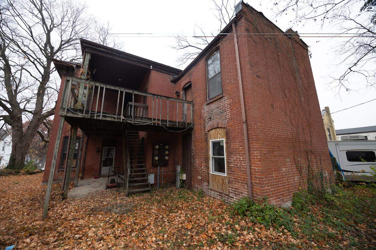 Some tenants of a former multifamily dwelling at 224 S. Charles St. in Belleville entered from the rear. Originally constructed as a single-family home, the vacant building is now owned by Kelli and Elijah Roberts.
