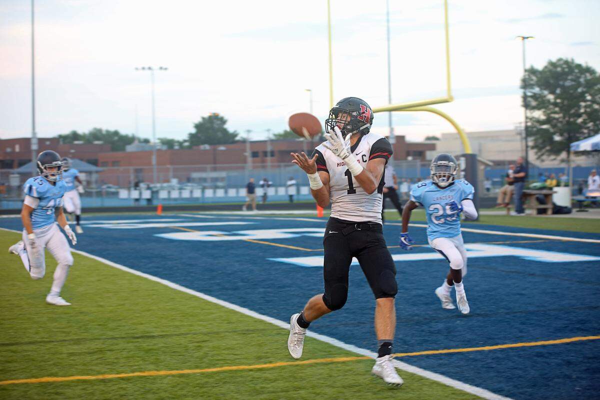 Highland’s Sam LaPorta makes the first of three touchdown catches in a win at Belleville East in Week 2.
