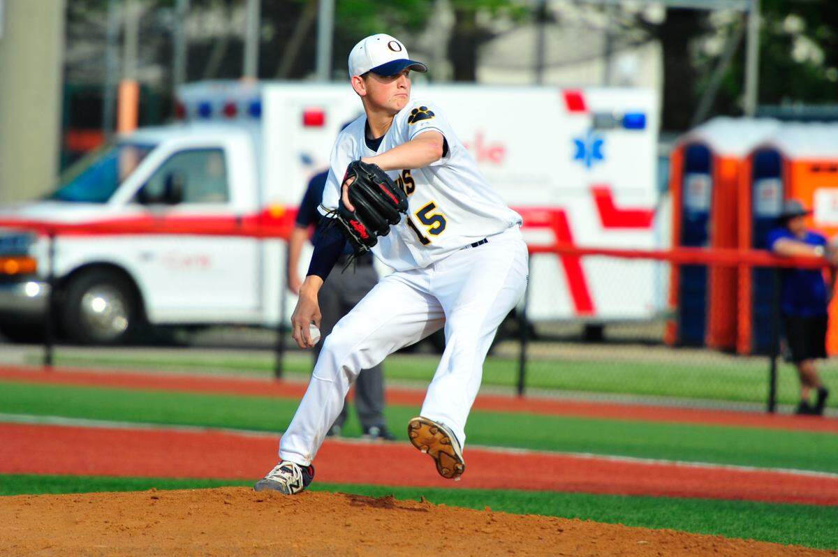 O'Fallon's Hayden Juenger delivers a pitch against Sandburg in the Class 4A University of Illinois Supersectional. Monday, June 4, 2018