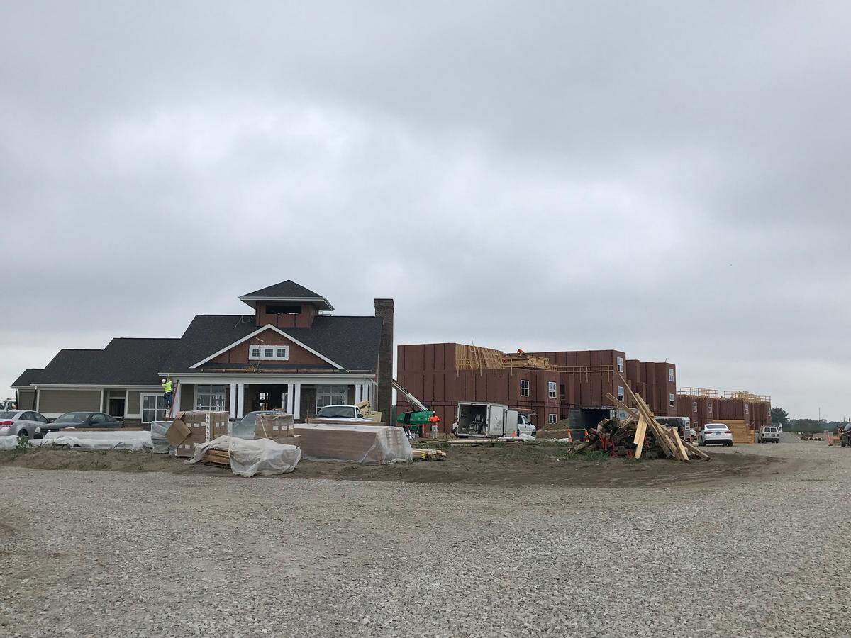 Thirteen01 at Hartman Lakes development in Shiloh. The first building is the clubhouse available to the future occupants of the multi-family residential project. The nine apartment buildings still under construction will have 216 units and about 60 garages.